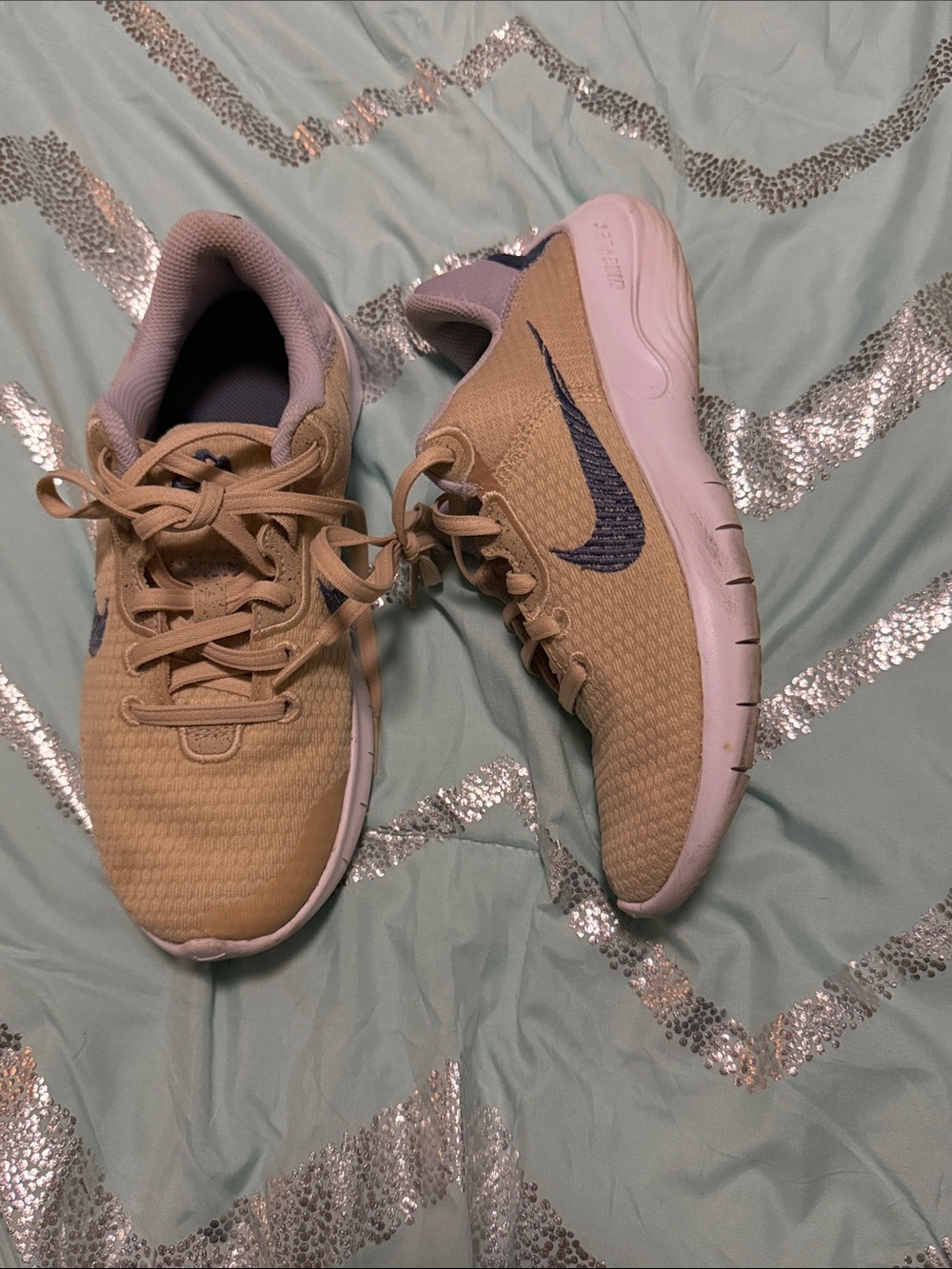 Nike Women's Tan Running Sneakers with Blue Swoosh